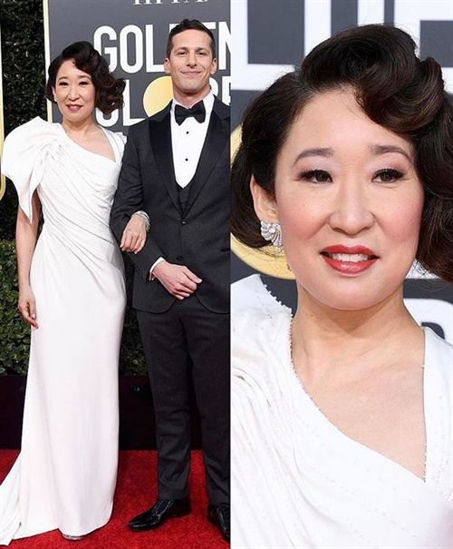 Andy Samberg in Bruno Cucinelli, Sandra Oh in Versace